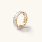 Waterproof gold crystal Cubic zirconia ring laying in a white background 