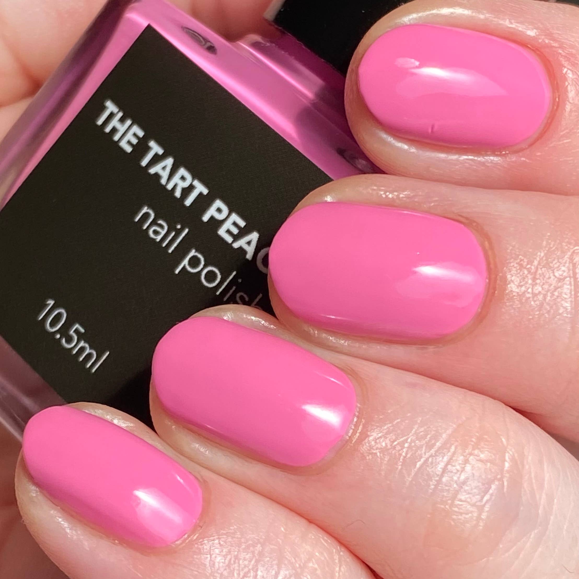 A Vibrant Pink Nail Polish in Hand | Buy Bubblegum Color Nail Polish at Form + Content 