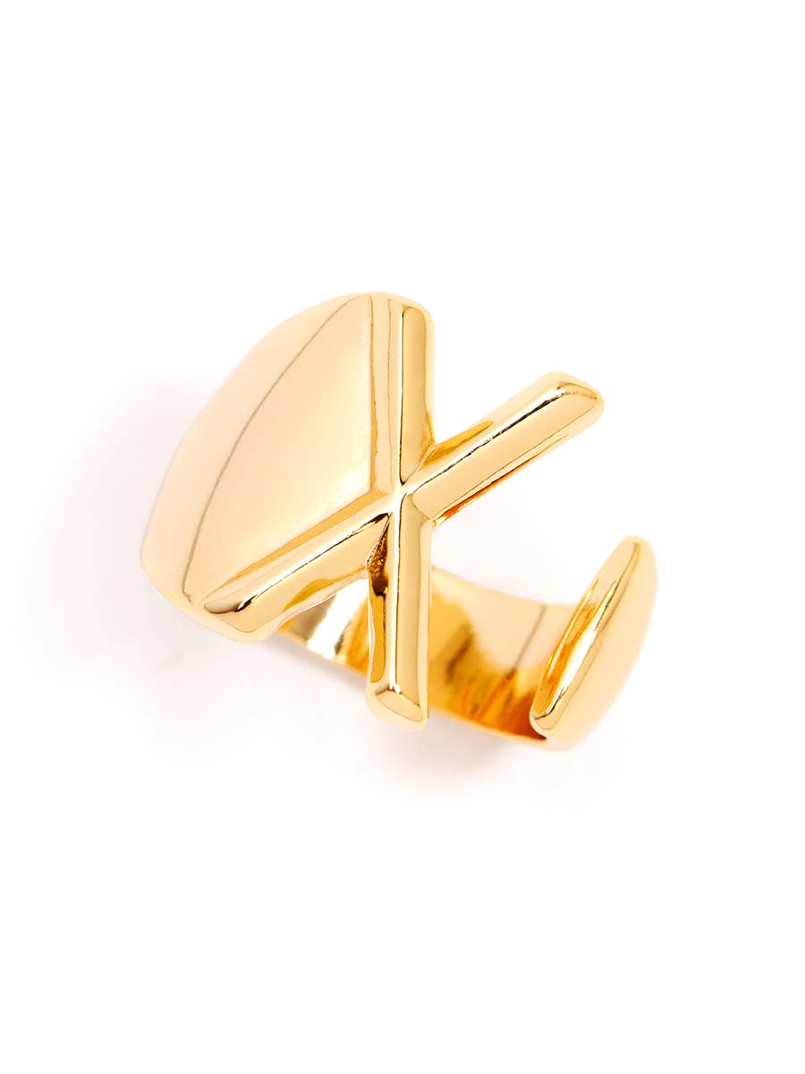 Gold adjustable letter ring on white background in letter X