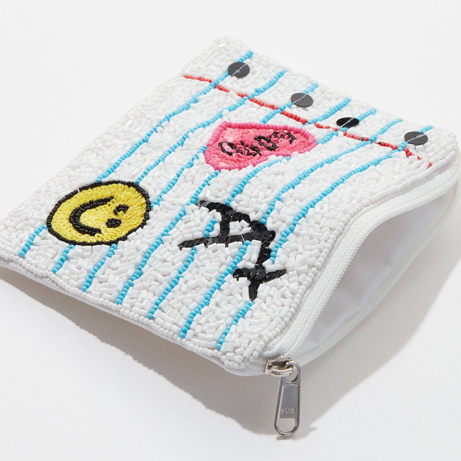Embroidered pouch with an A plus, heart, and smiley face on a white background