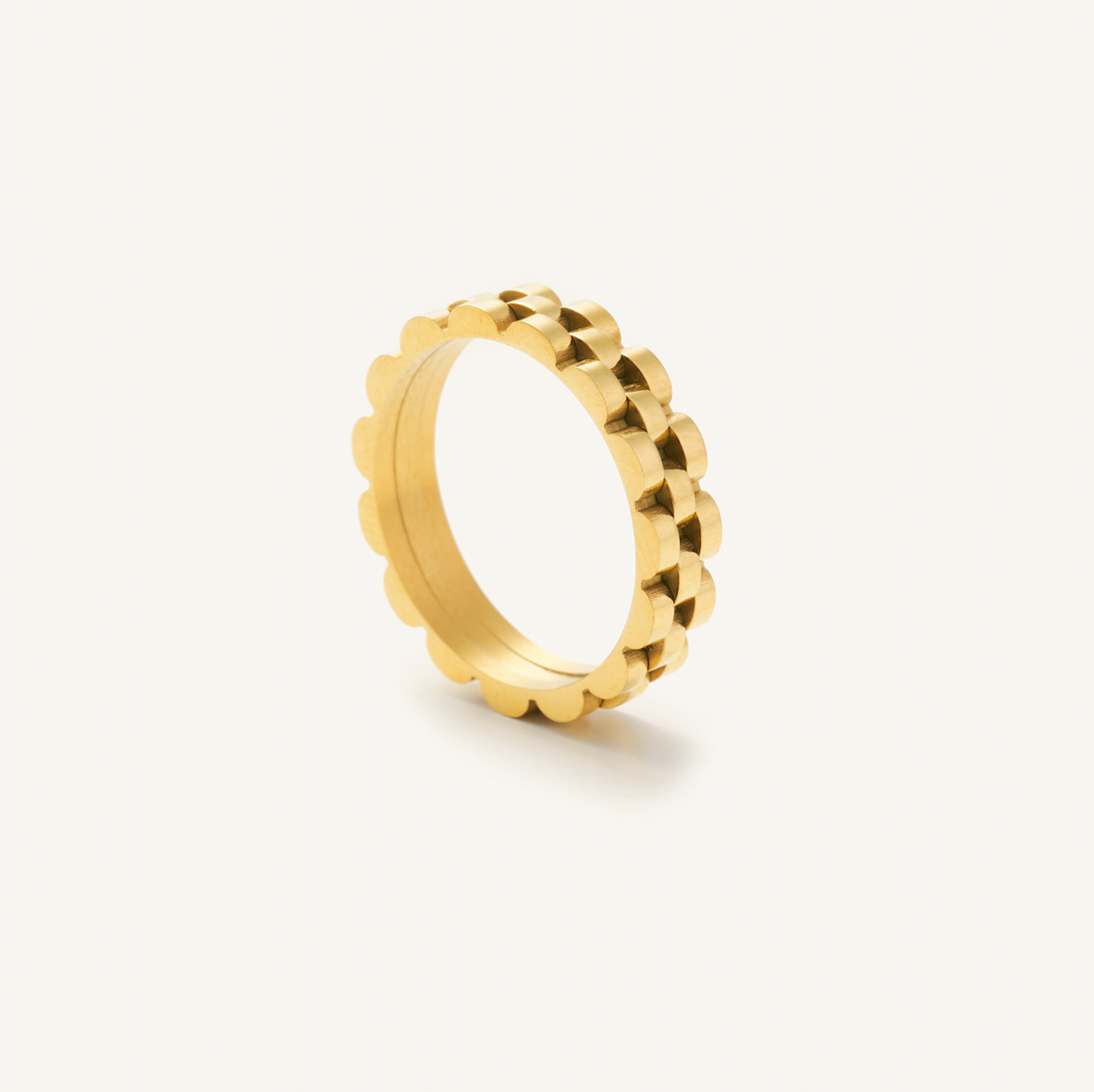 Gold, waterproof, tarnish free, watch band ring on a white background 