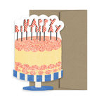 Yellow Happy Birthday cake with pink frosting and sprinkles card with a brown envelope. 