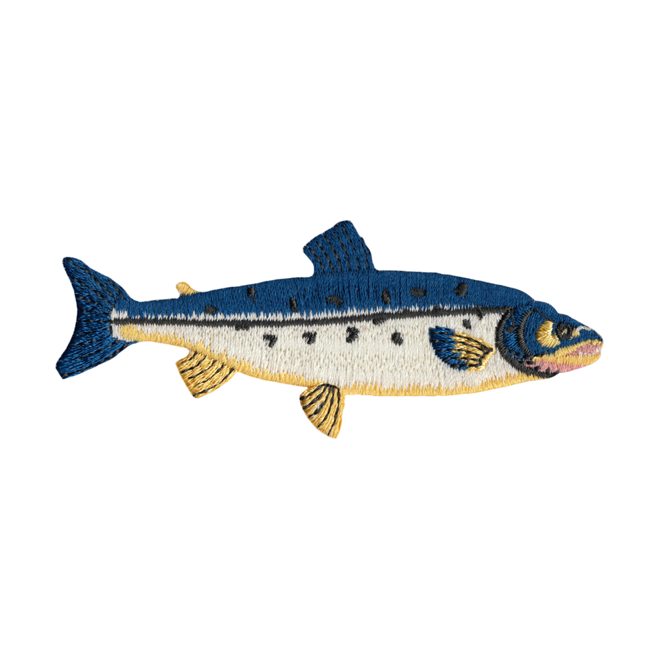 Embroidered fish patch with blue, yellow, and white colors on a white background