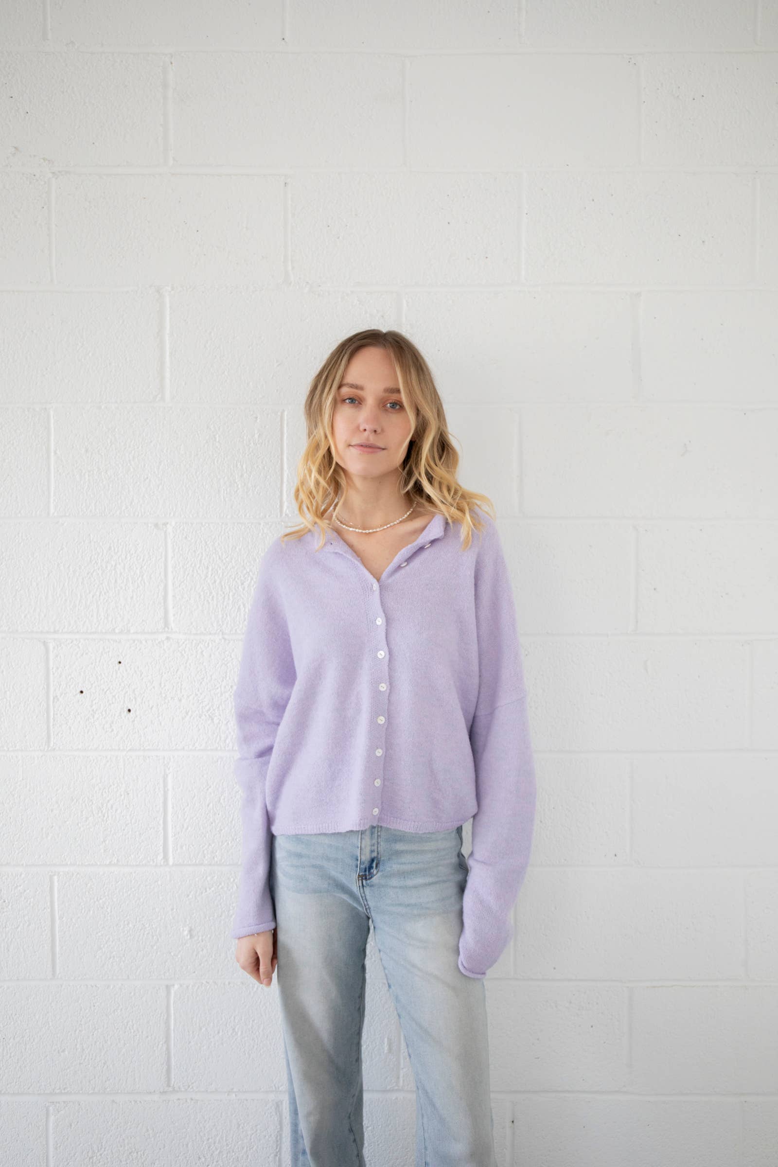 model wearing purple lavender button up cardigan