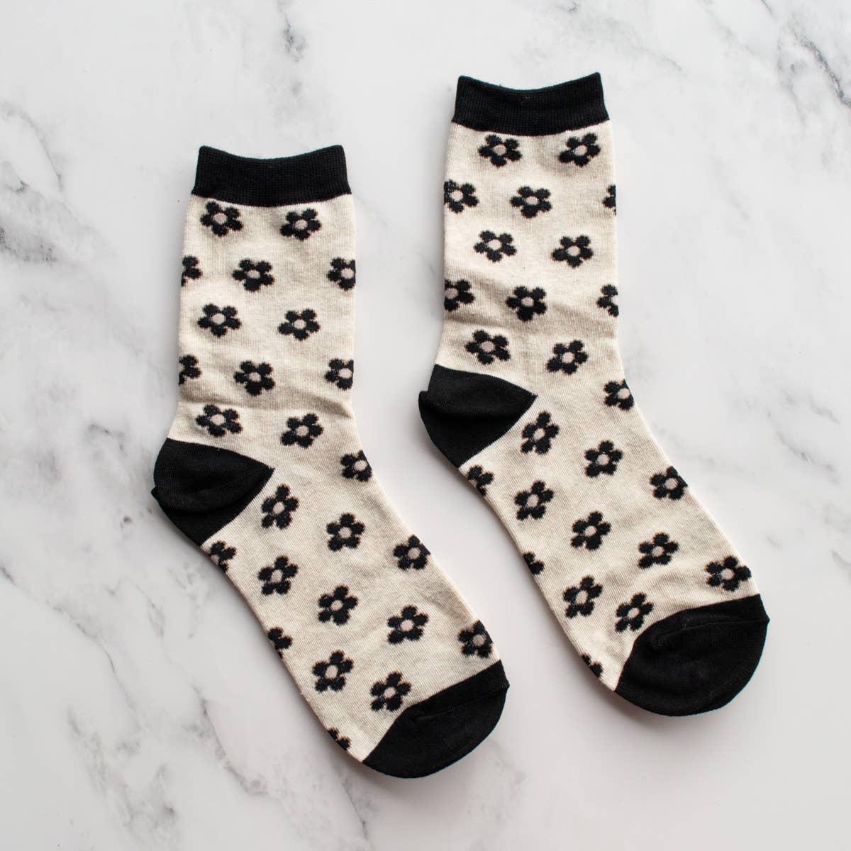 cream white socks with black doodled flowers and accents