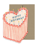 Light pink and red heart shaped happy birthday cake card with candles on top and a brown envelope behind it. 