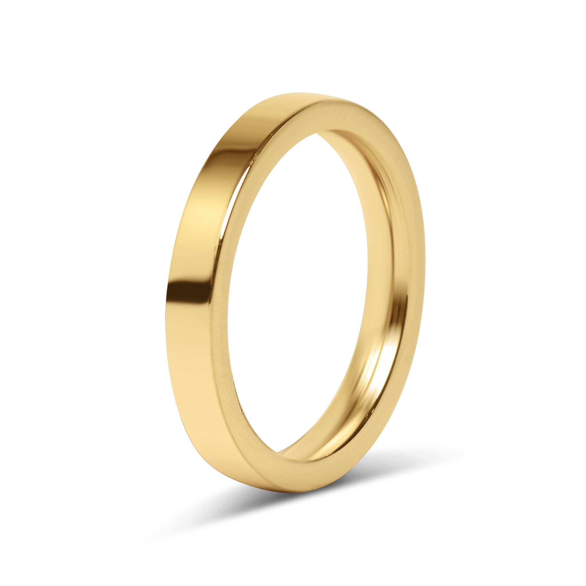 Gold ring on a white background
