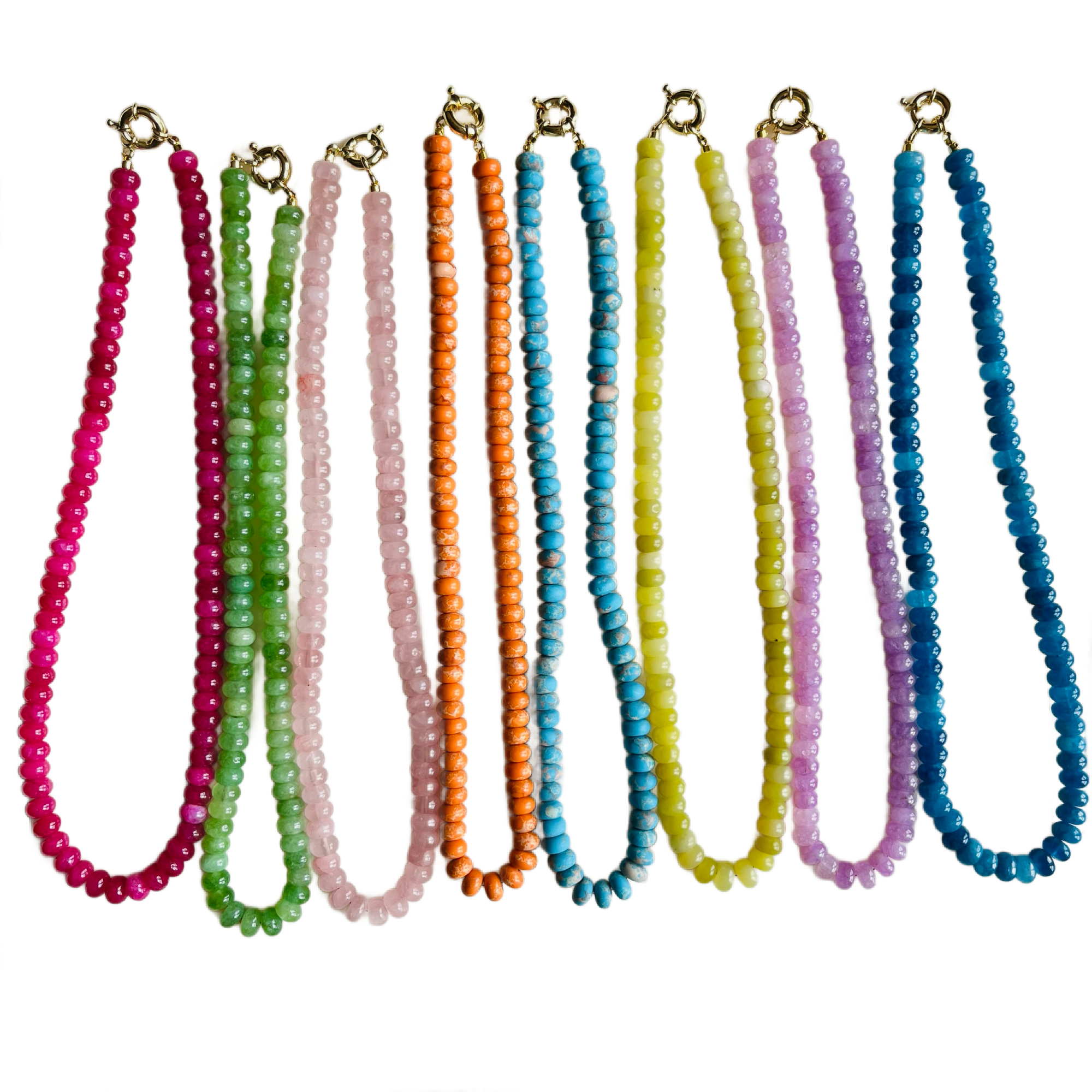 Set of colorful beaded necklaces on a white background