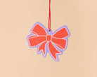 red bow car air freshener with lavender and pink details