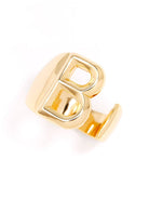 Gold adjustable letter ring on white background in letter B