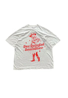 White oversized tee-shirt that has Star Spangled Smokeshow in bright red letters with a bright red cowgirl on the front. 