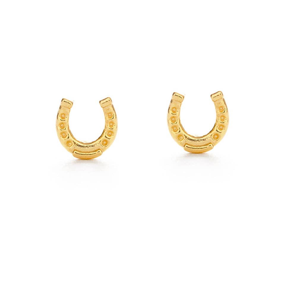 Gold horseshoe-shaped earrings on a white background