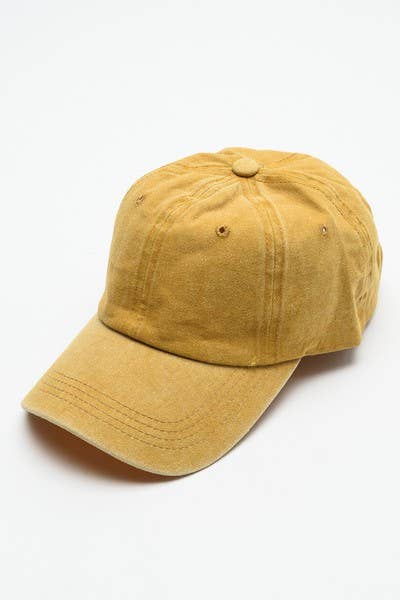 Yellow baseball cap on a white background