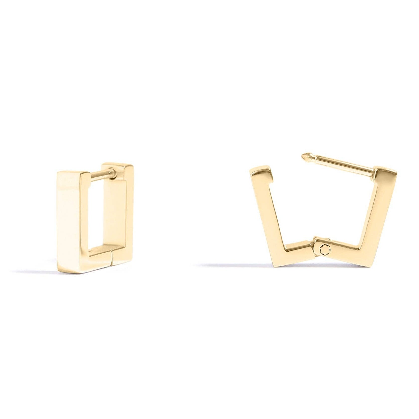 Gold hoop earrings on a white background