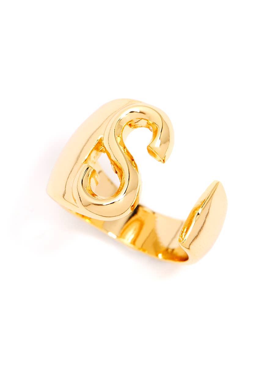 Gold adjustable letter ring on white background in letter S