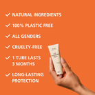 Hand holding beige deodorant balm tube with product highlights listed 