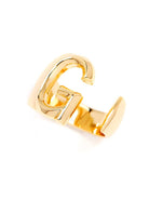 Gold adjustable letter ring on white background in letter G