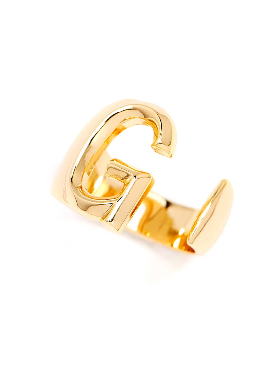 Gold adjustable letter ring on white background in letter G