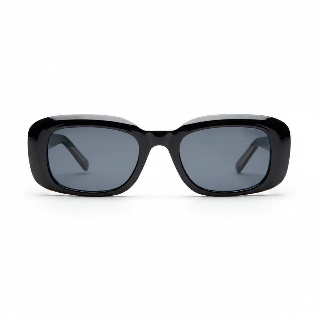 Black sunglasses with dark lenses on a white background