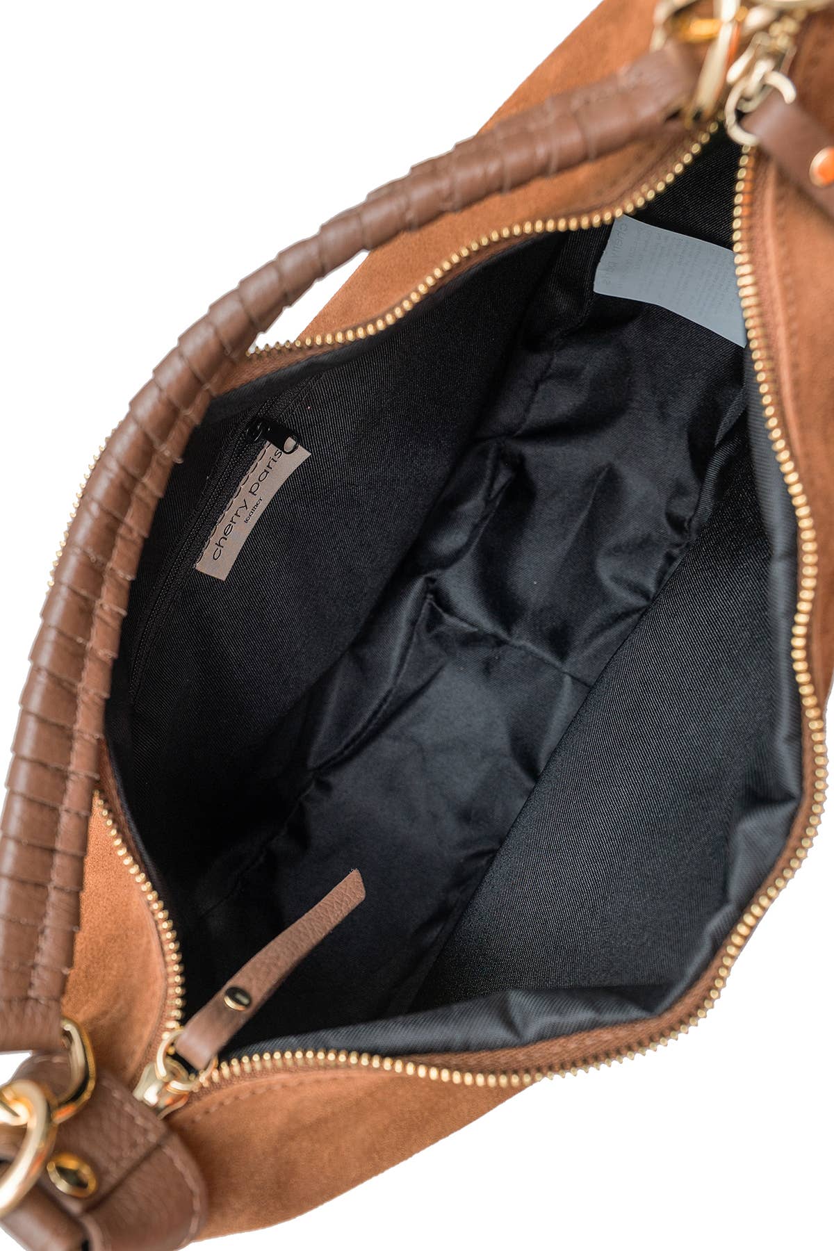 Inside view of Chestnut brown, real suede bag with gold embellished details and multiple strap options 