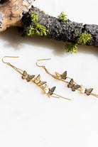 gold butterflies dripping chain earrings 