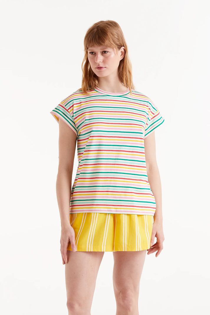 Woman wearing multi-stripe stripped t-shirt and yellow shorts 