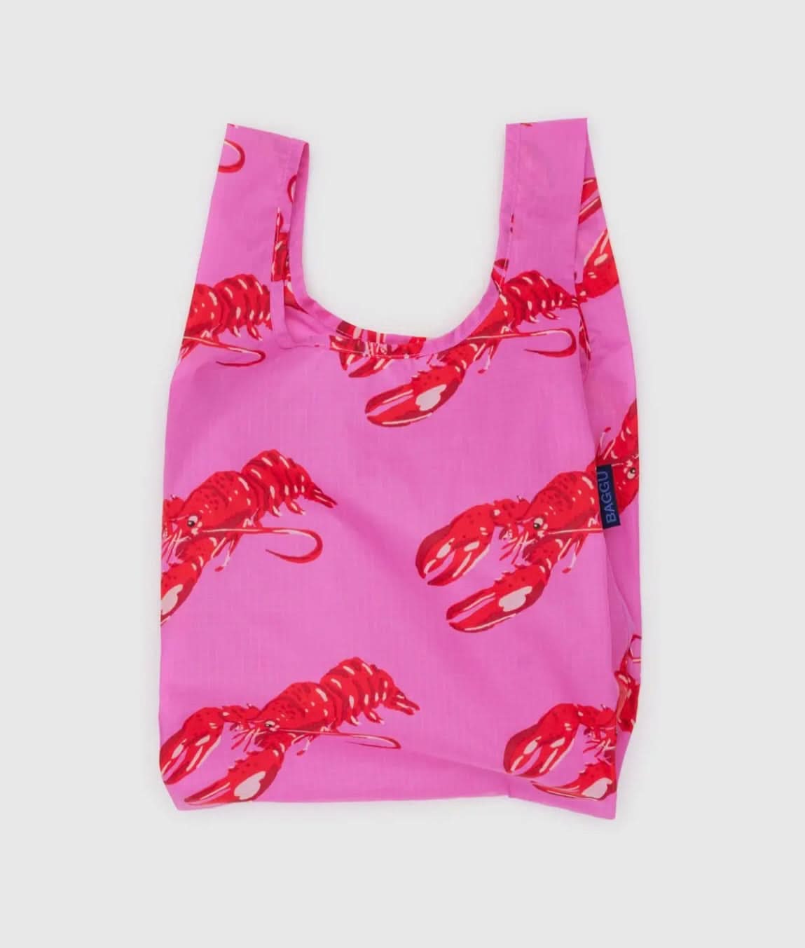 reuseable, foldable pink baby baggu bag depicting red lobsters all over the bag 
