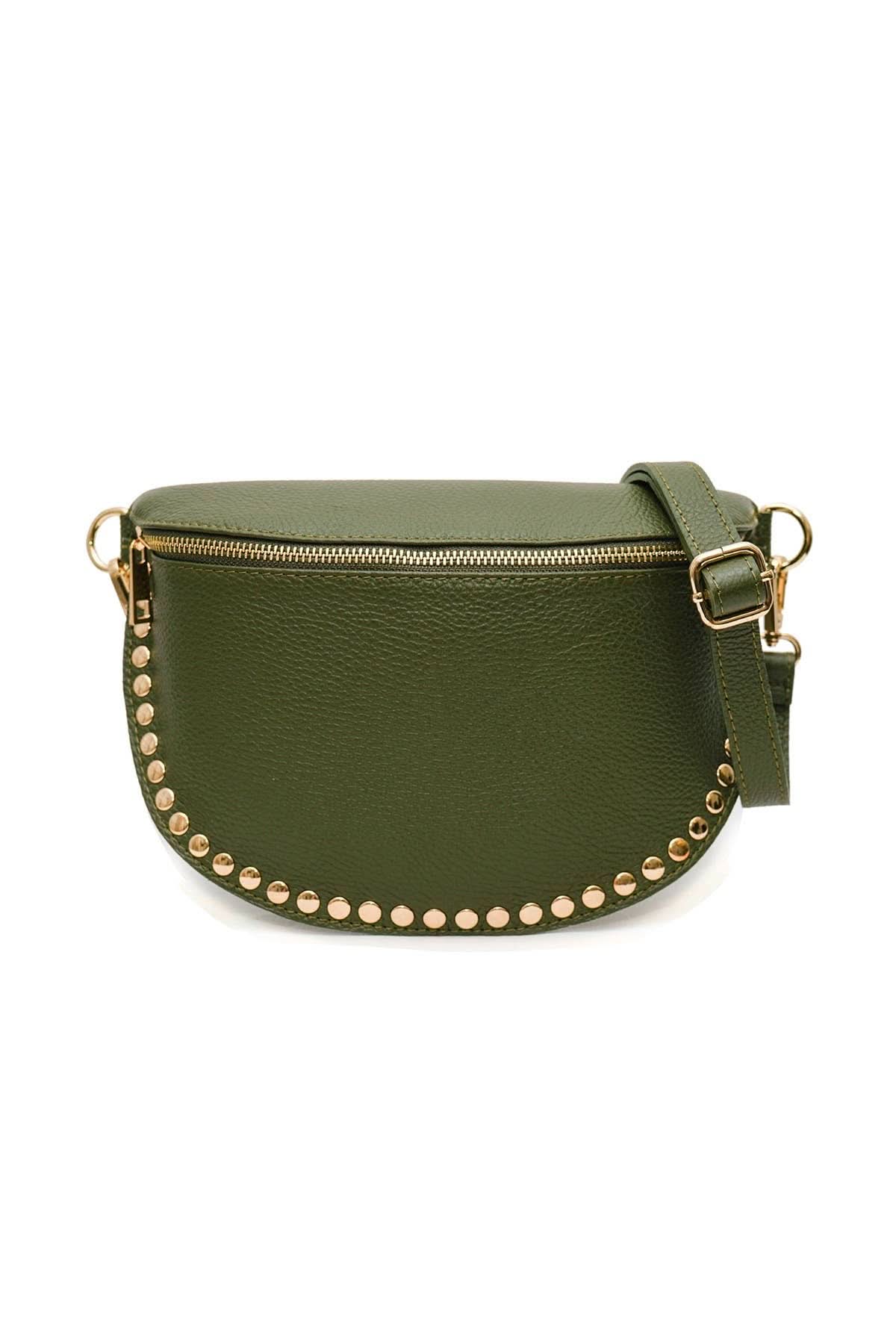 Green leather crossbody bag with gold studs on a white background
