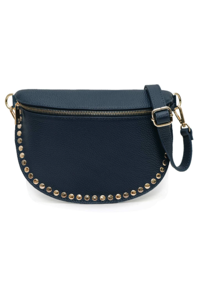 Navy blue handbag with gold studs on a white background
