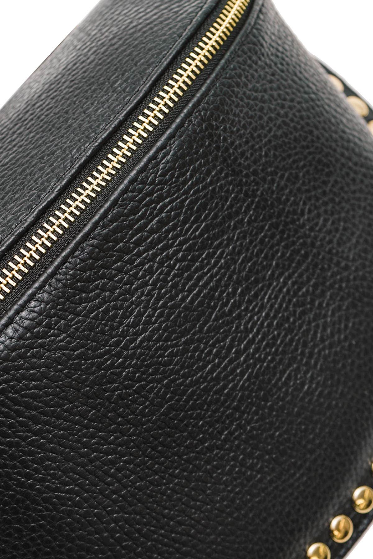 Black leather bag with gold zipper and studs