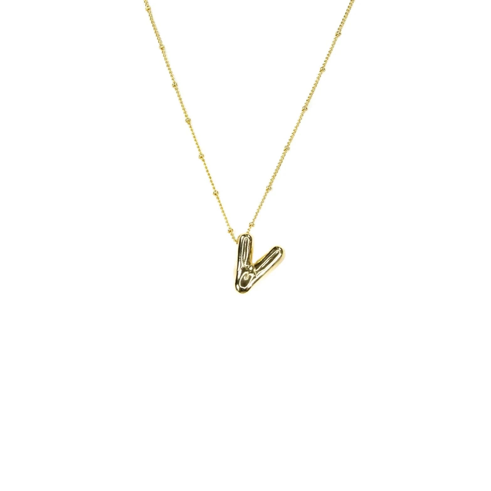 Gold necklace with a 'V' pendant 