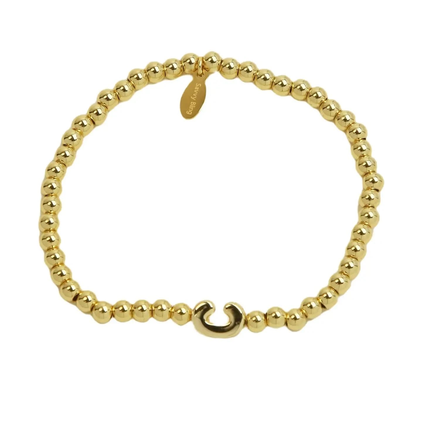 Gold beaded bracelet with a hook clasp on a white background
