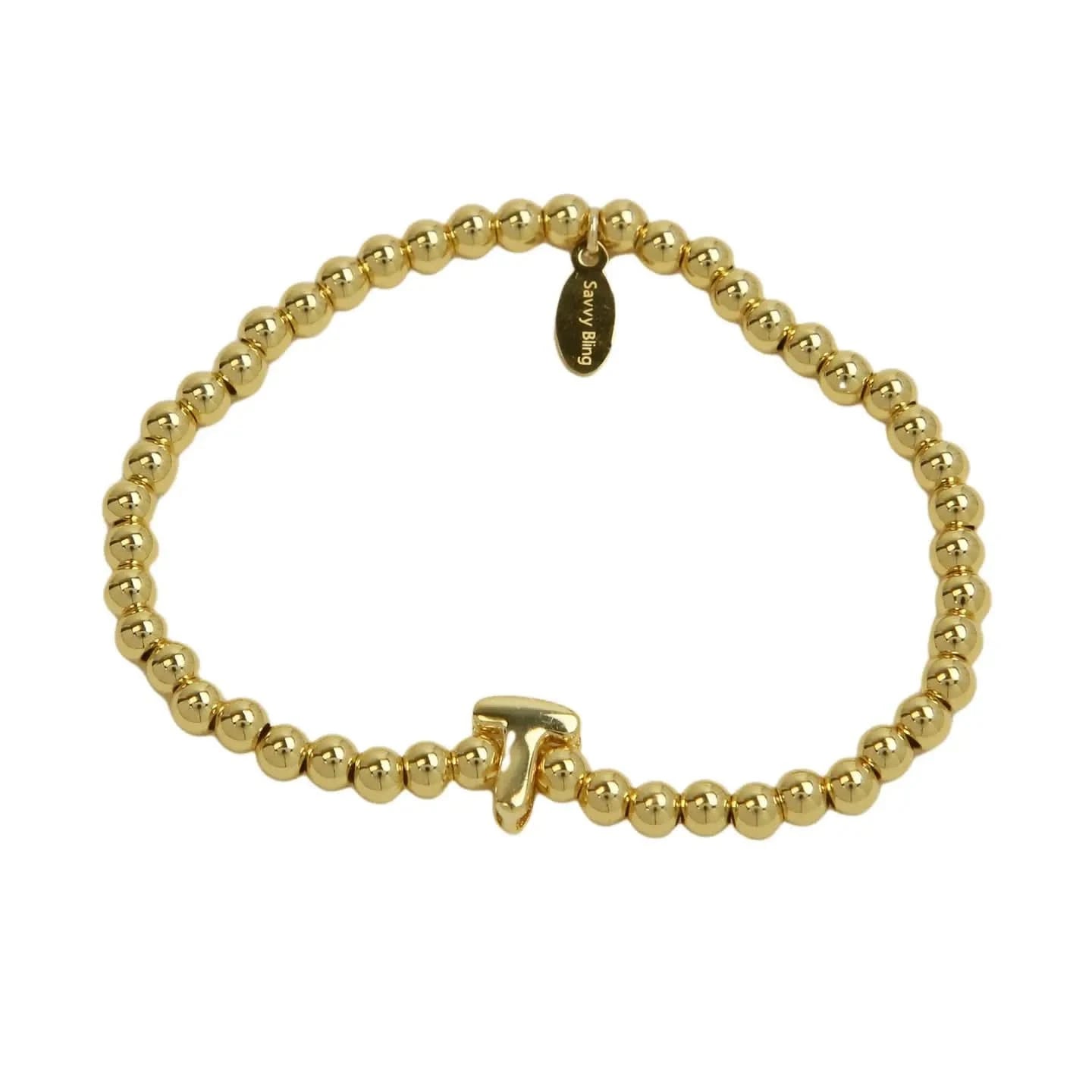Gold beaded bracelet on a white background