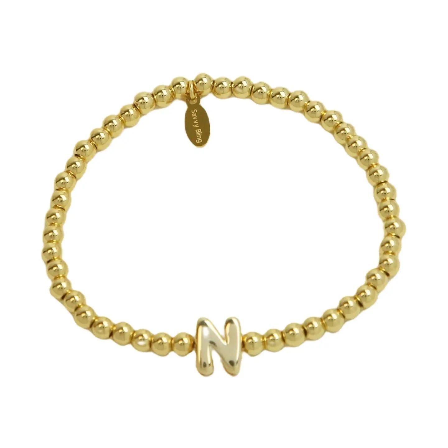 Gold beaded bracelet with a gold letter 'N' charm on a white background