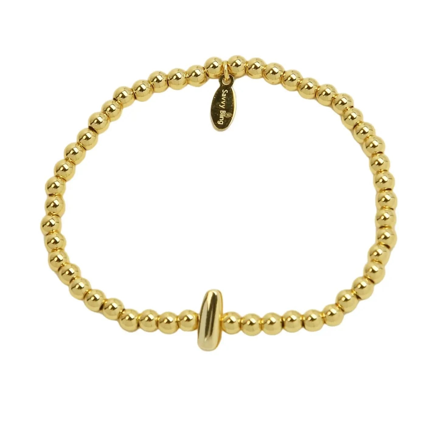 Gold beaded bracelet on a white background