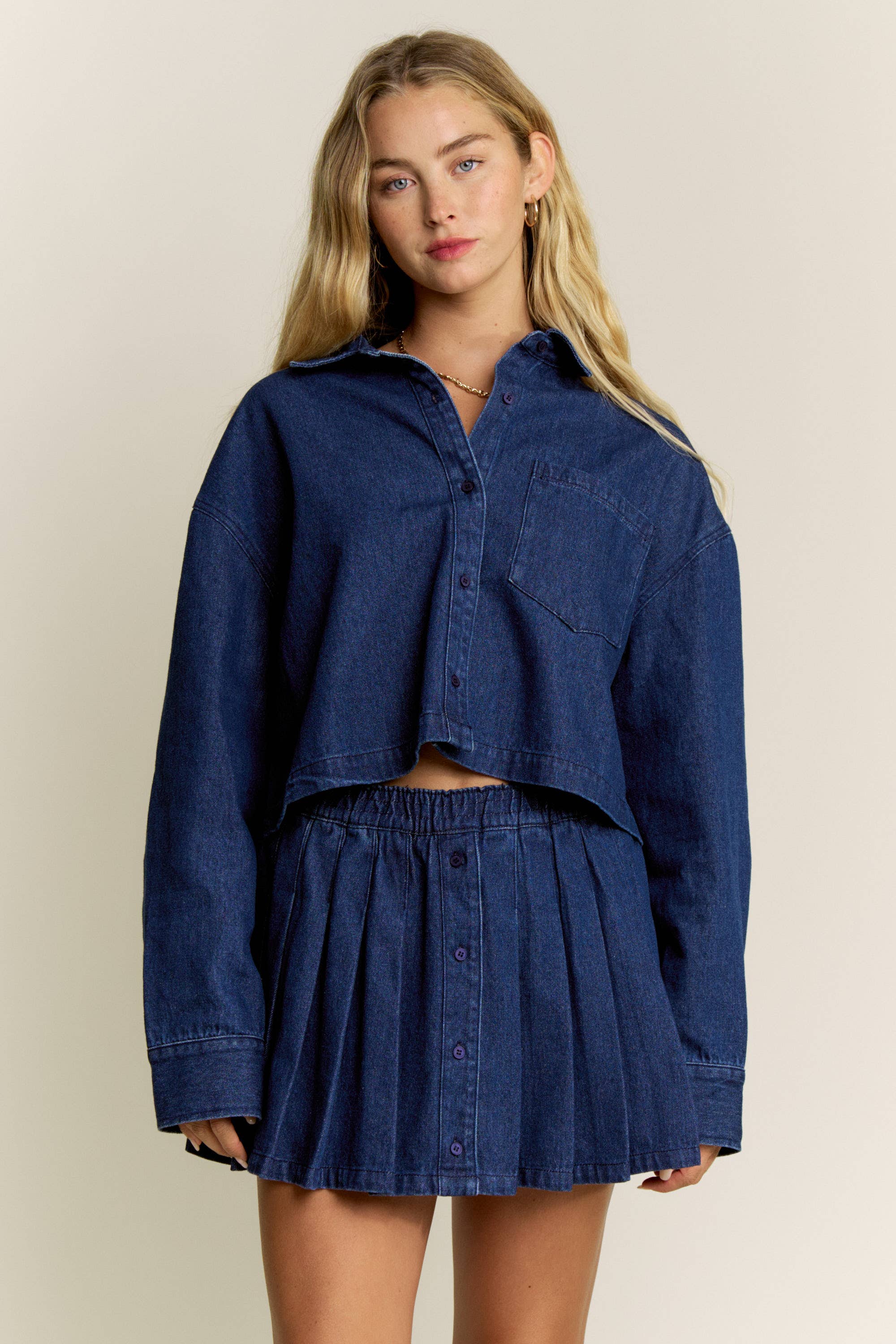 classic denim look, this pleated skort combines the style of a mini skirt