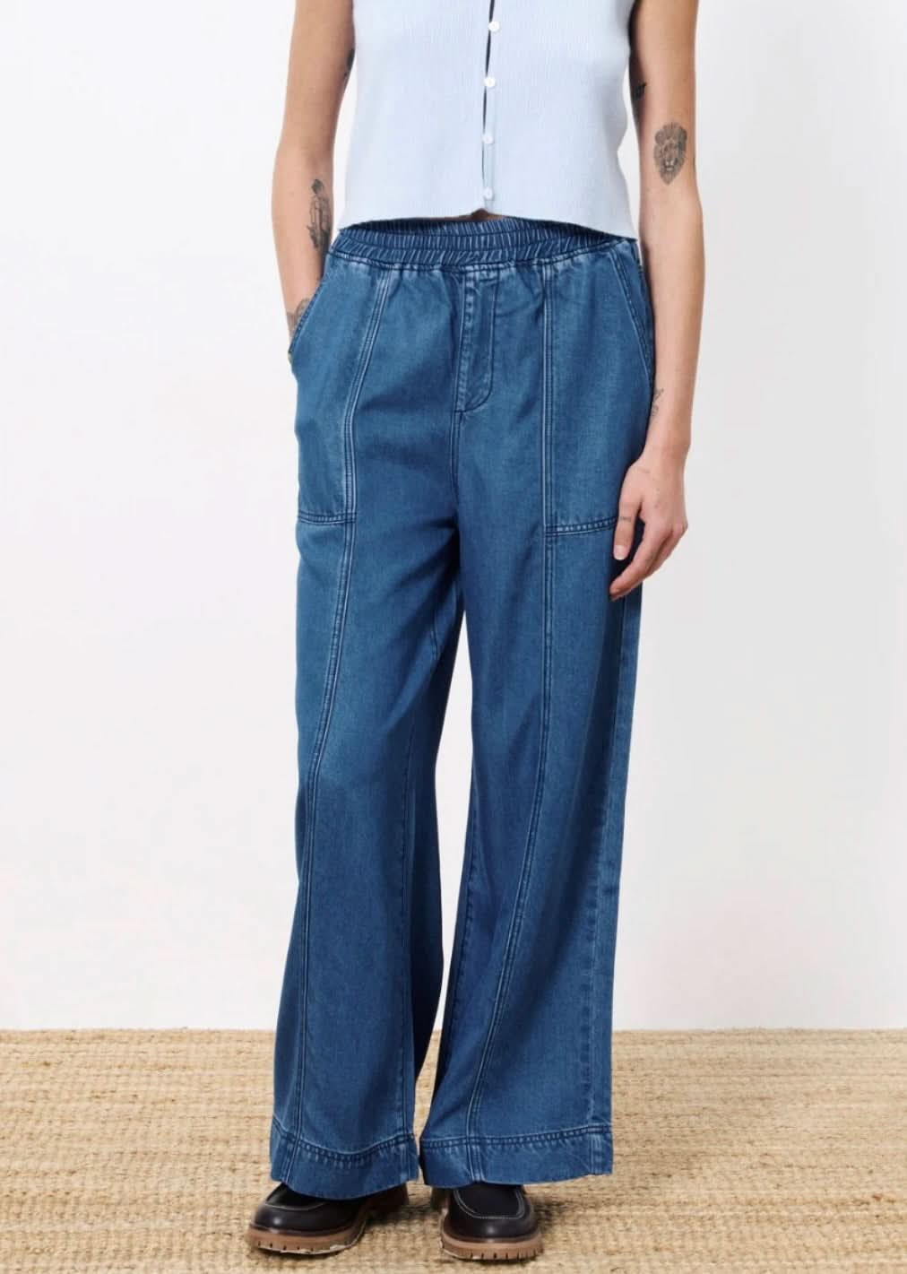 Close-up of FRNCH Marine Pants – Lightweight Navy Fabric and Side Pocket Detail