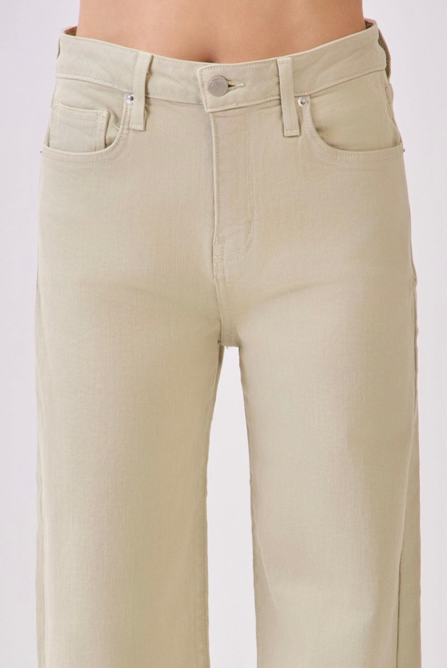Beige jeans on a white background