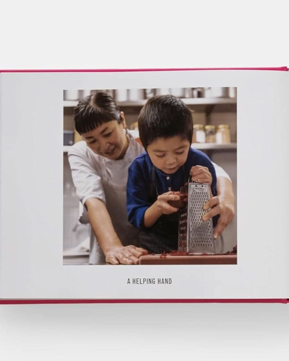 “A helping hand” from “breakfast lunch tea” pictures a mother and her son cooking together on the left page and the table of contents on the right page