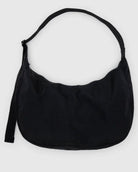 Black crescent shape handbag zip closure