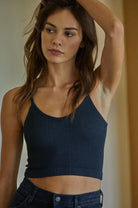 Woman wearing distressed, black, ribbed, spaghetti strap Brami tank top 