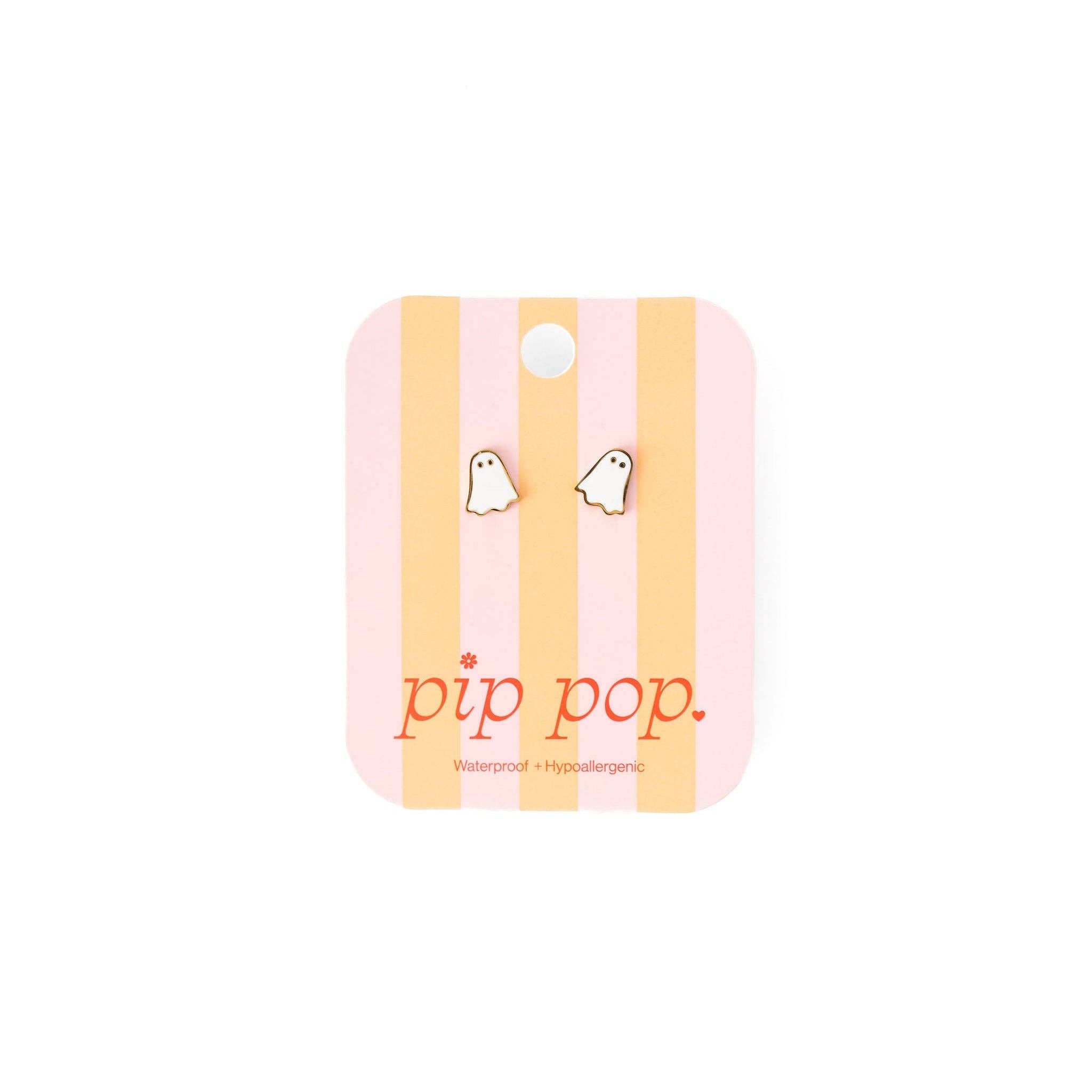 Pair of earrings on a 'pip pop.' branded card with pink and yellow design.