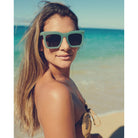 Model wearing Sage green sunglasses with polarized lens 