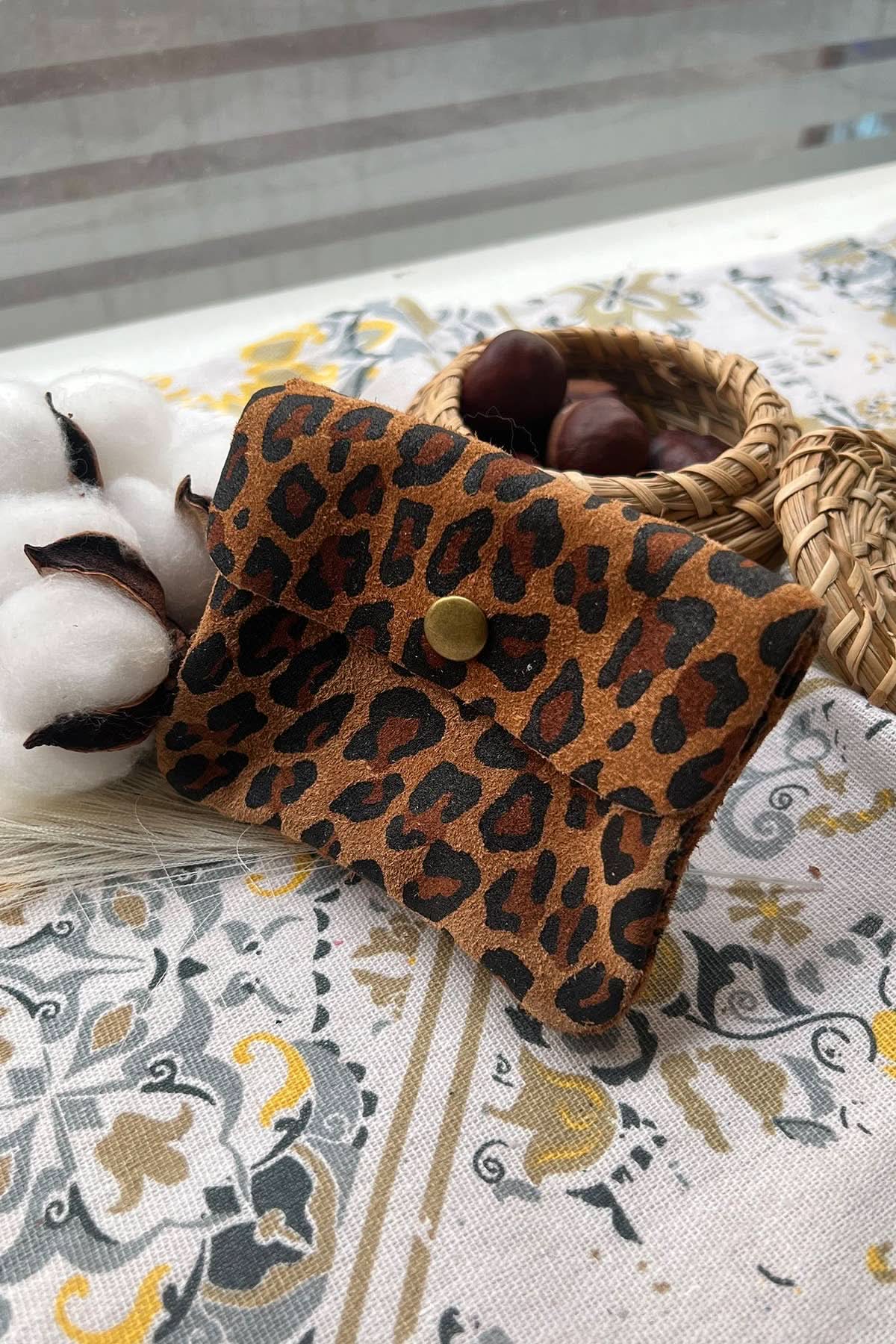 Chestnut brown leopard wallet with metal button clasp