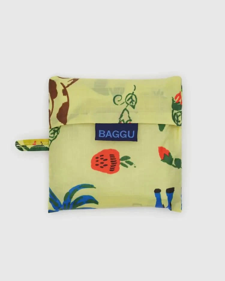 Folded up Pear green baby baggu reuseable grocery with painted prairie designs throughout the bag