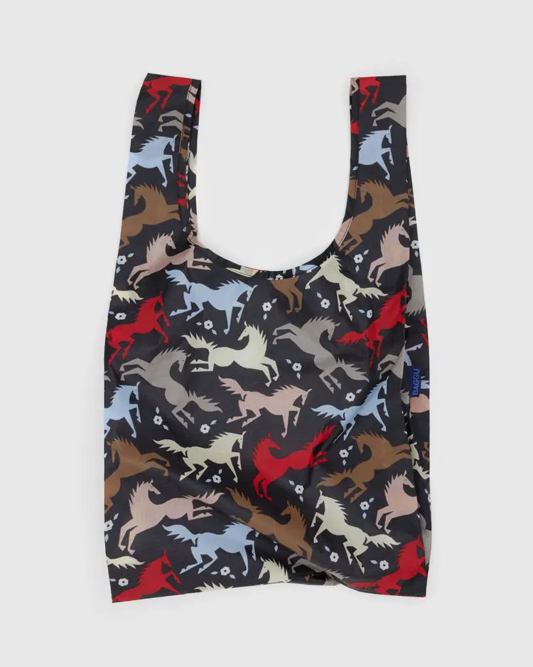 Dark grey black baby baggu reuseable bag with colorful horse cutouts throughout the print 