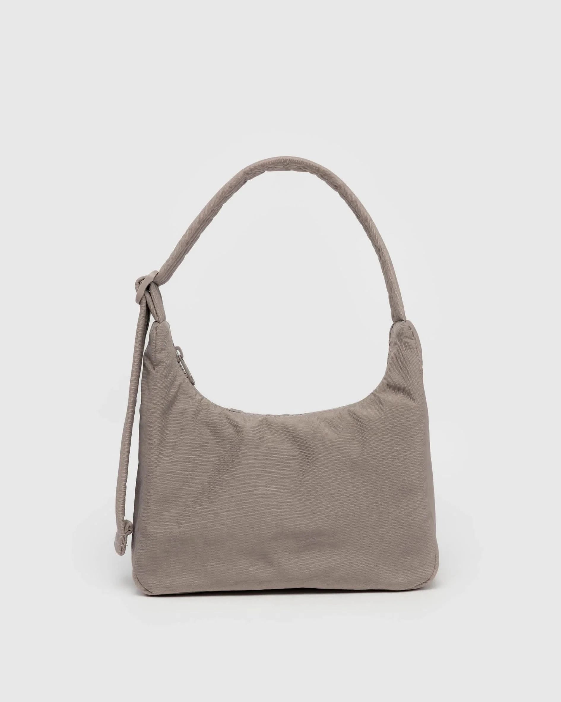 Gray shoulder bag on a light gray background