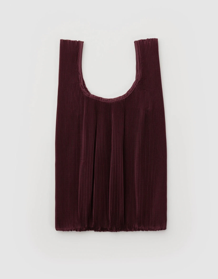 Maroon ribbed knit tank top on a light gray background