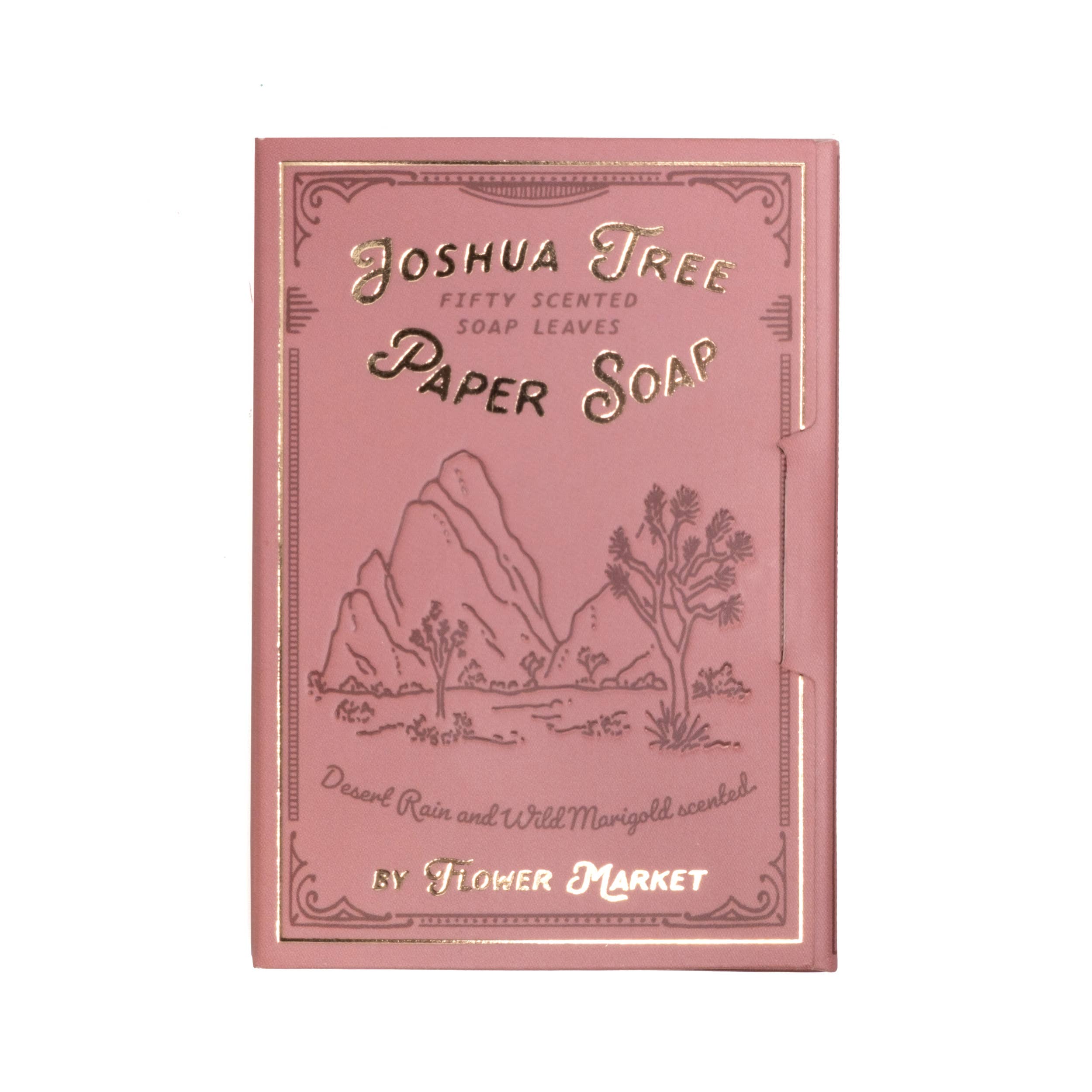 Pink packaging of Joshua Tree Paper Soap with desert-themed illustration on a white background