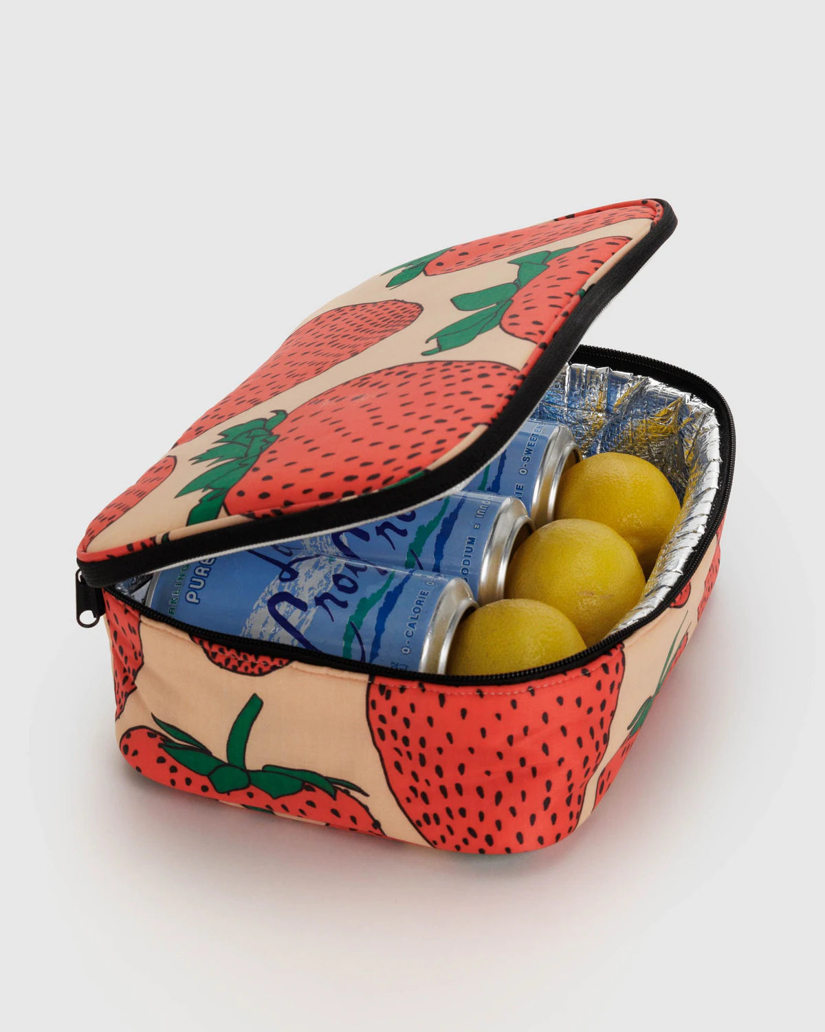 Rectangular pouch with strawberry pattern containing two cans and two yellow balls on a white background